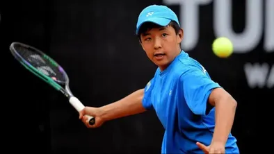 Зангар Нурланулы во время матча турнира ITF J300 в Австралии