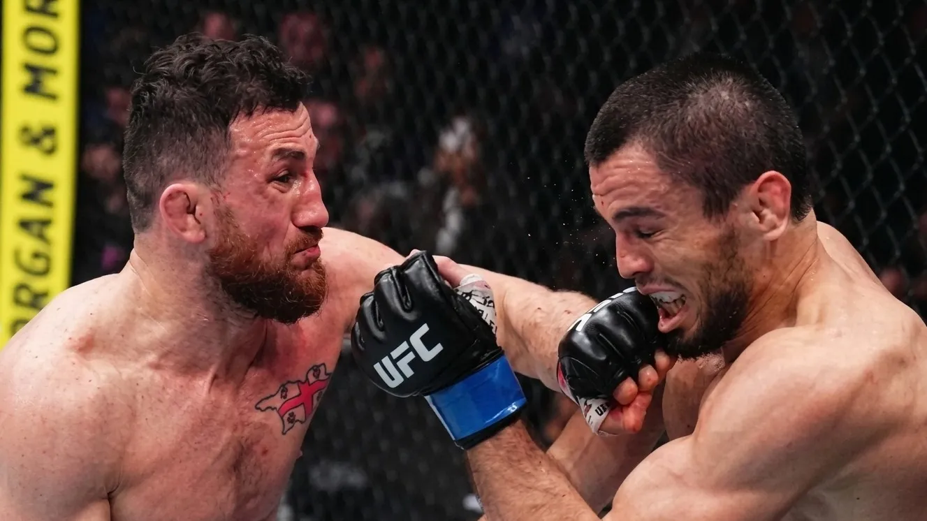 Кадр из боя на турнире UFC 311. Мераб против Умара