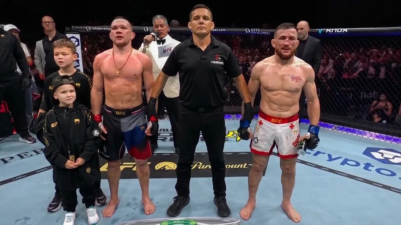 Петр Ян проиграл два раунда, но защитил титул UFC в бою с Двалишвили